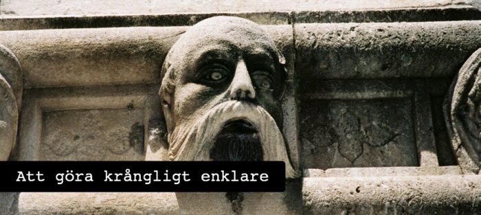 * F8 Text på stenansikte2
